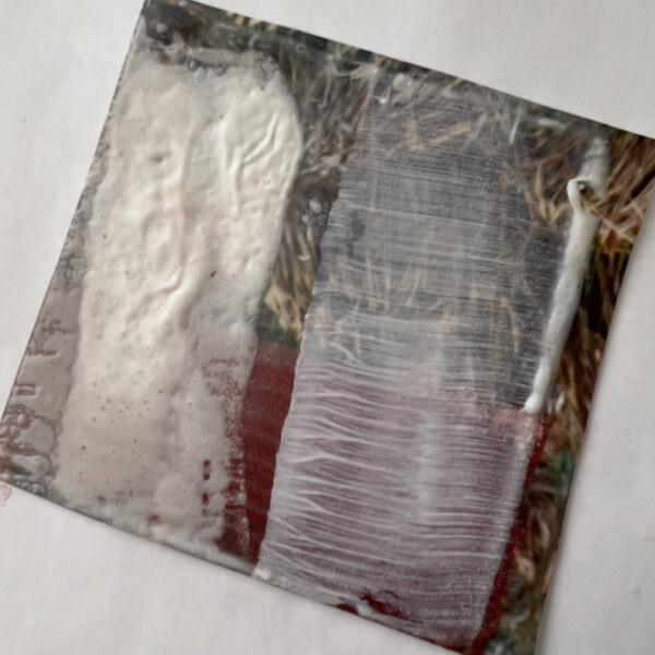 Experimenting with gesso and a heat gun: textured gesso on the left, a fresh and thin layer of gesso on the right.