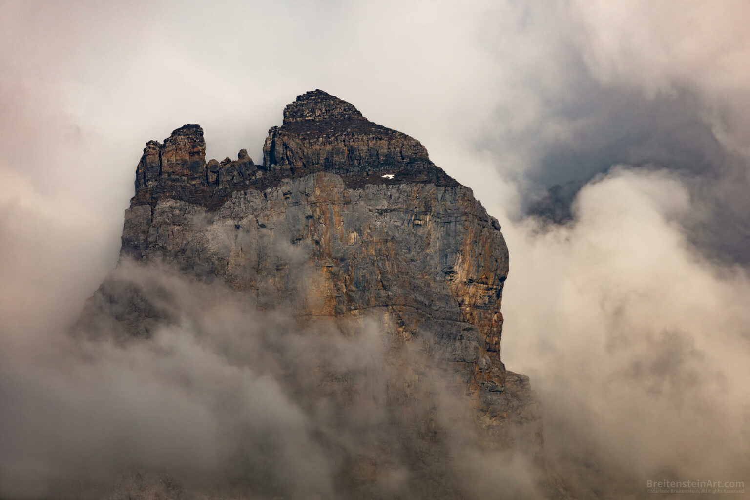 Photo of a mountain top rock outcropping called Nünihorn.
